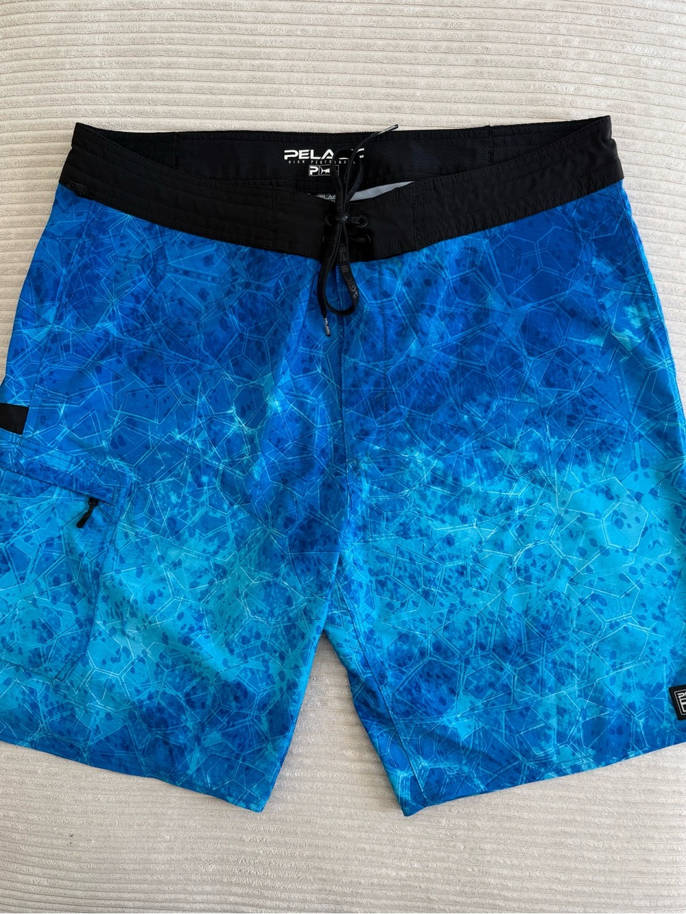 Pelagic Blue Geometric Swim Board Shorts with Black Waistband